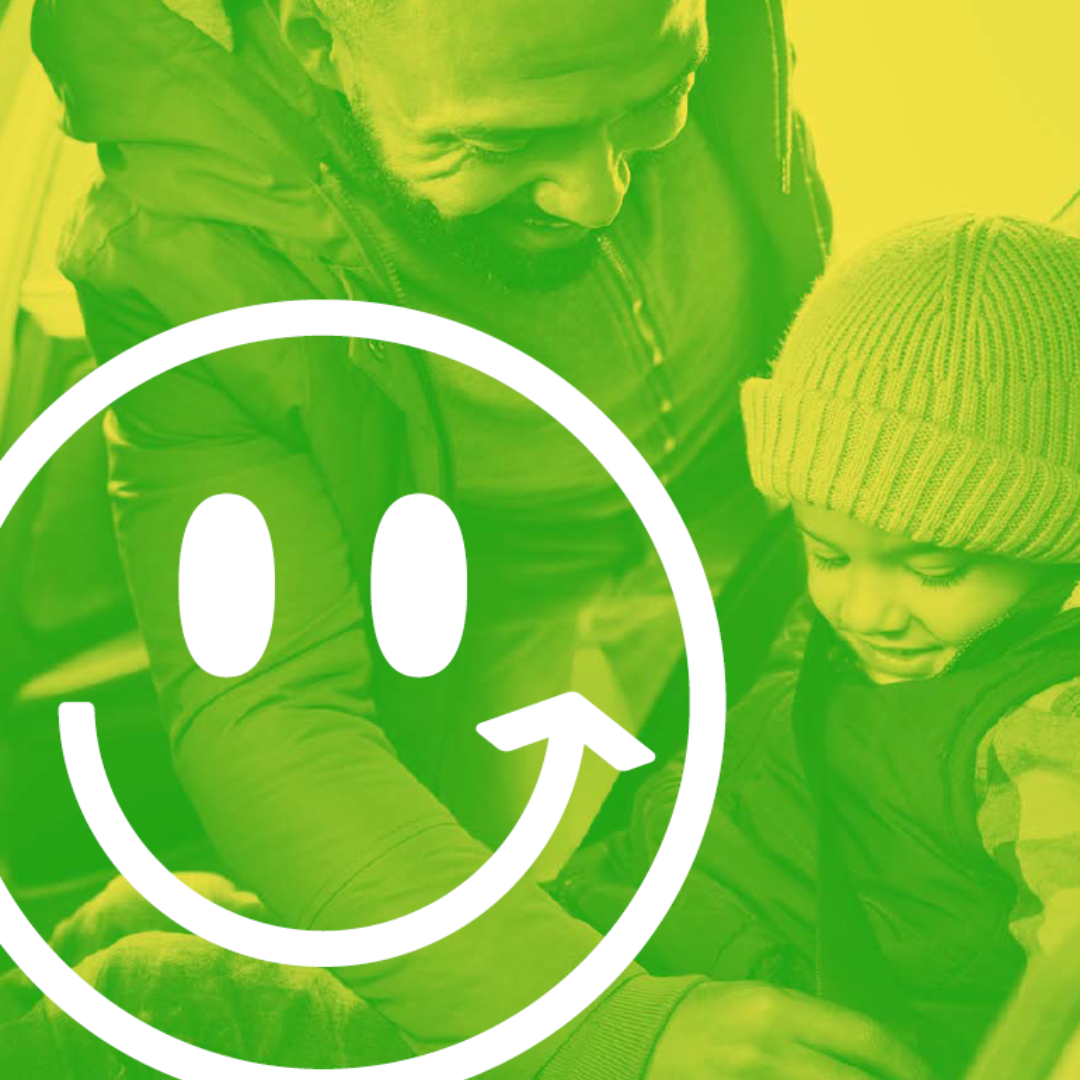 Photograph of a man seat belting a child into a vehicle with the Good Move smiley face logo overlaid.